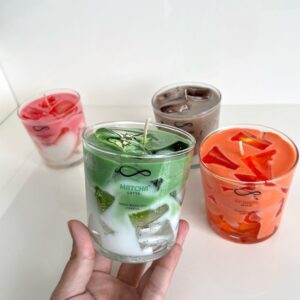 Realistic Iced Latte Candle in clear glass with wax ice cubes and layered coffee milk design