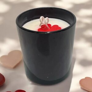 Glossy black jar candle with soy wax and elegant design, perfect for home décor and gifting.