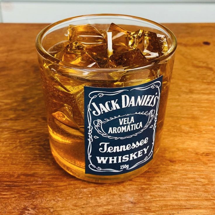 Whiskey-style candle in Jack Daniel’s glass with wax ice cubes