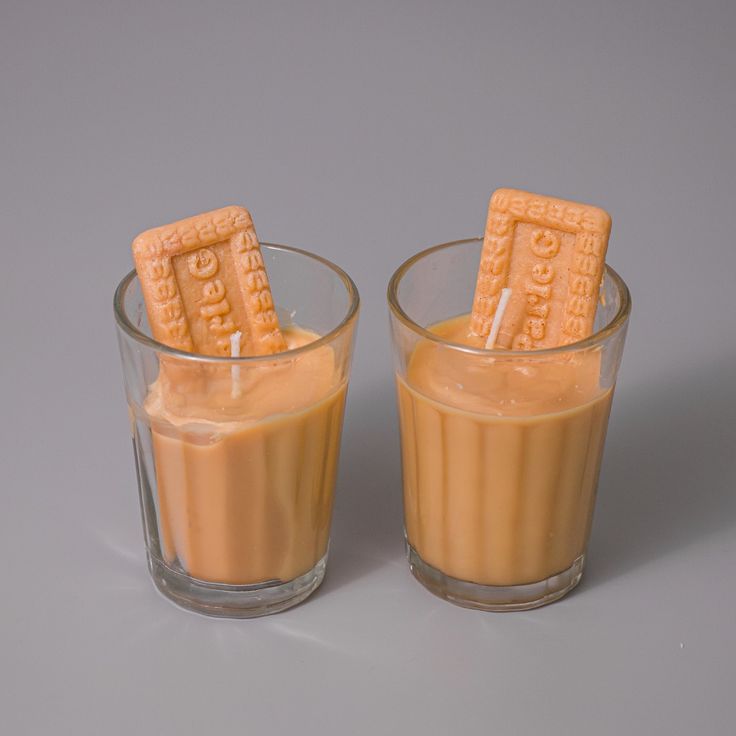Handmade Chai Biscuit Candle in glass cup with realistic biscuit-shaped wax topper
